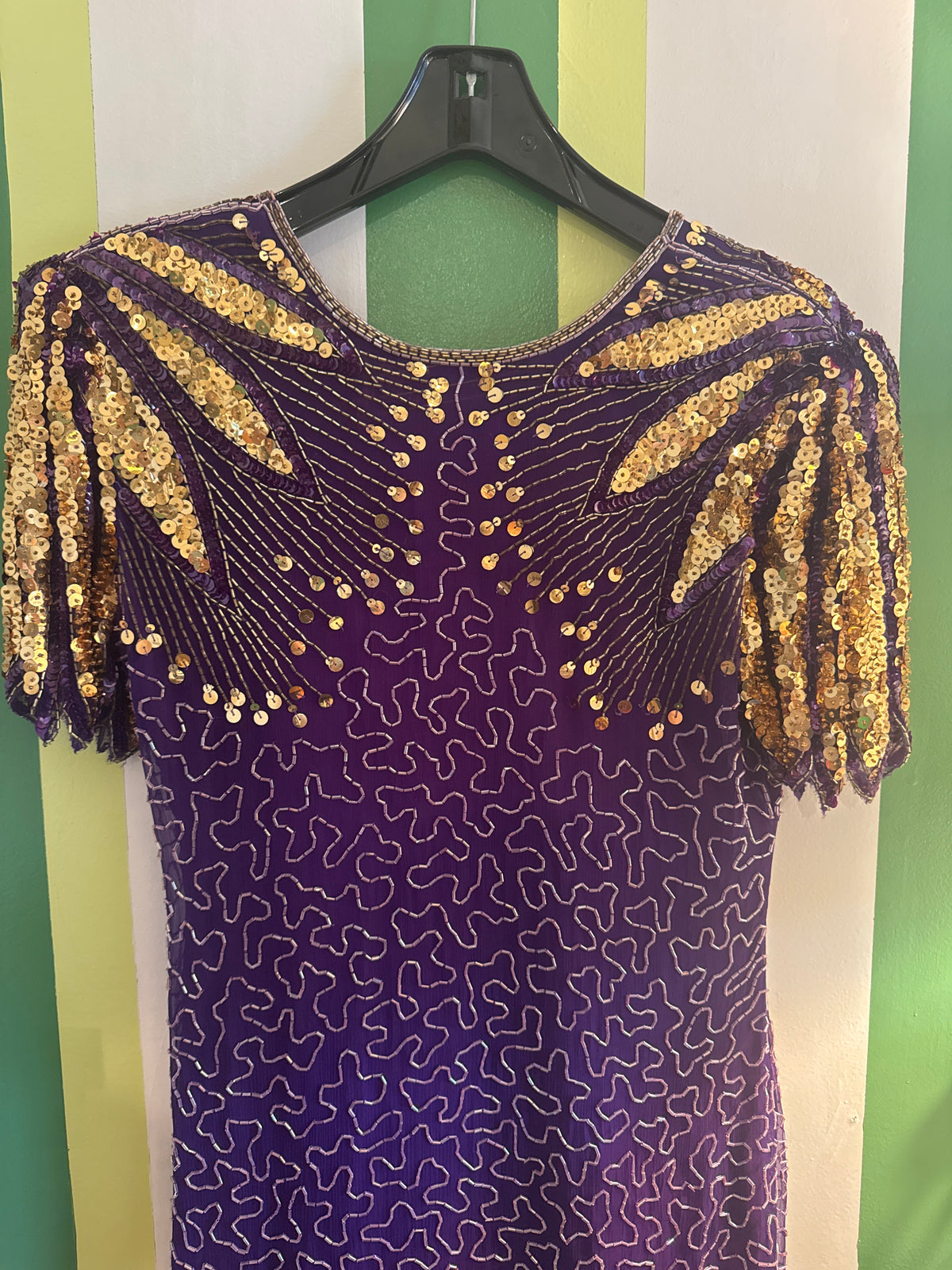Purple and gold beaded gown