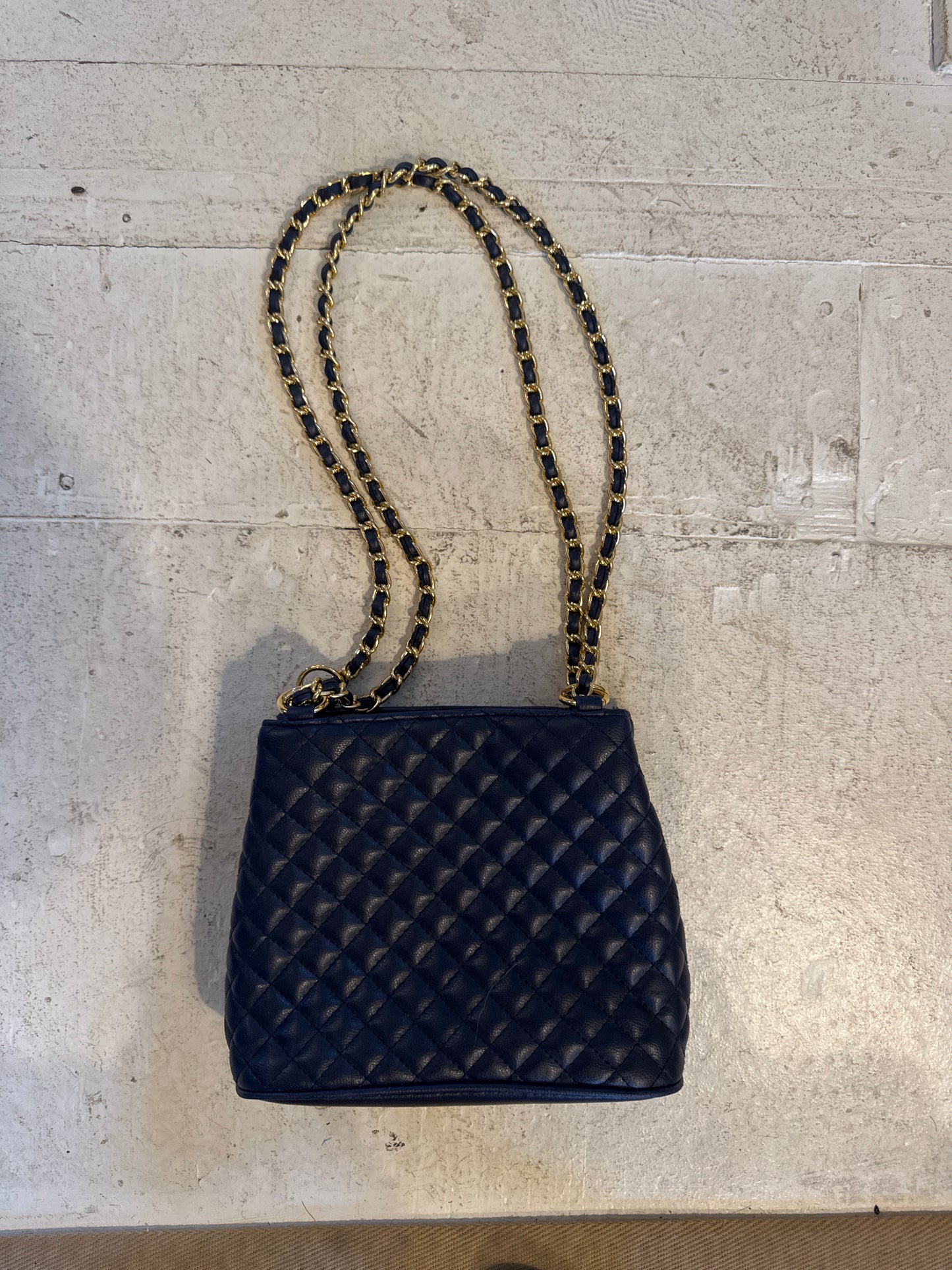 Vintage navy quilted handbag