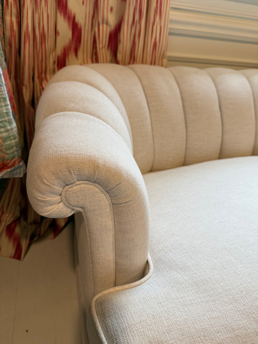 White channel backed settee