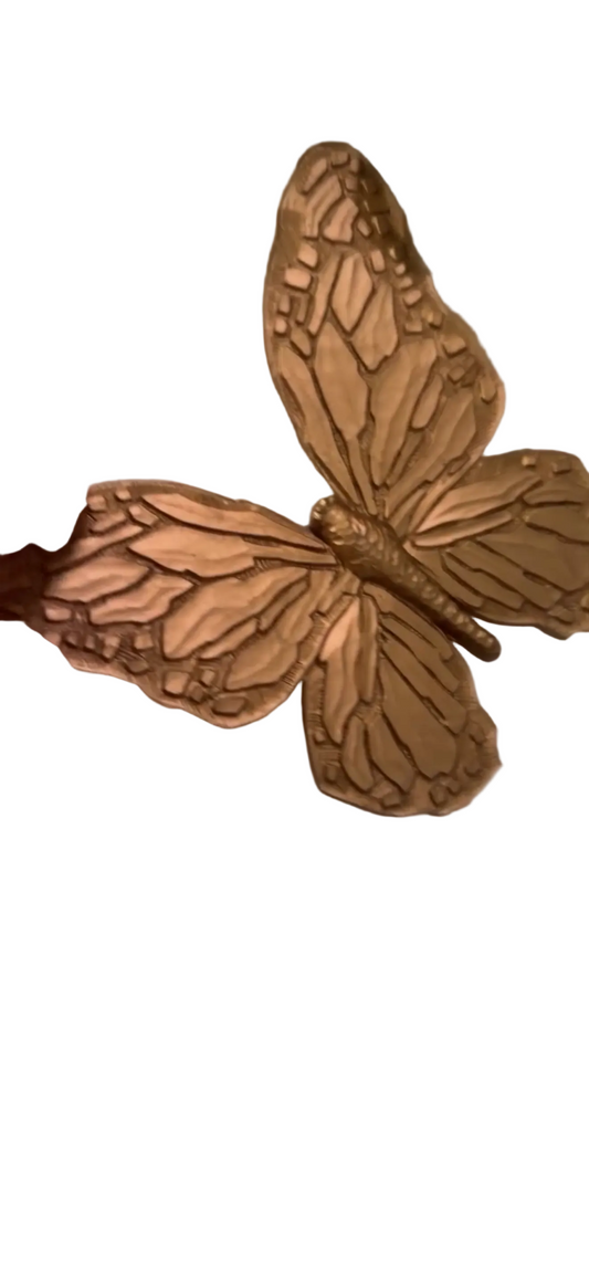 A pair of MCM resin butterflies