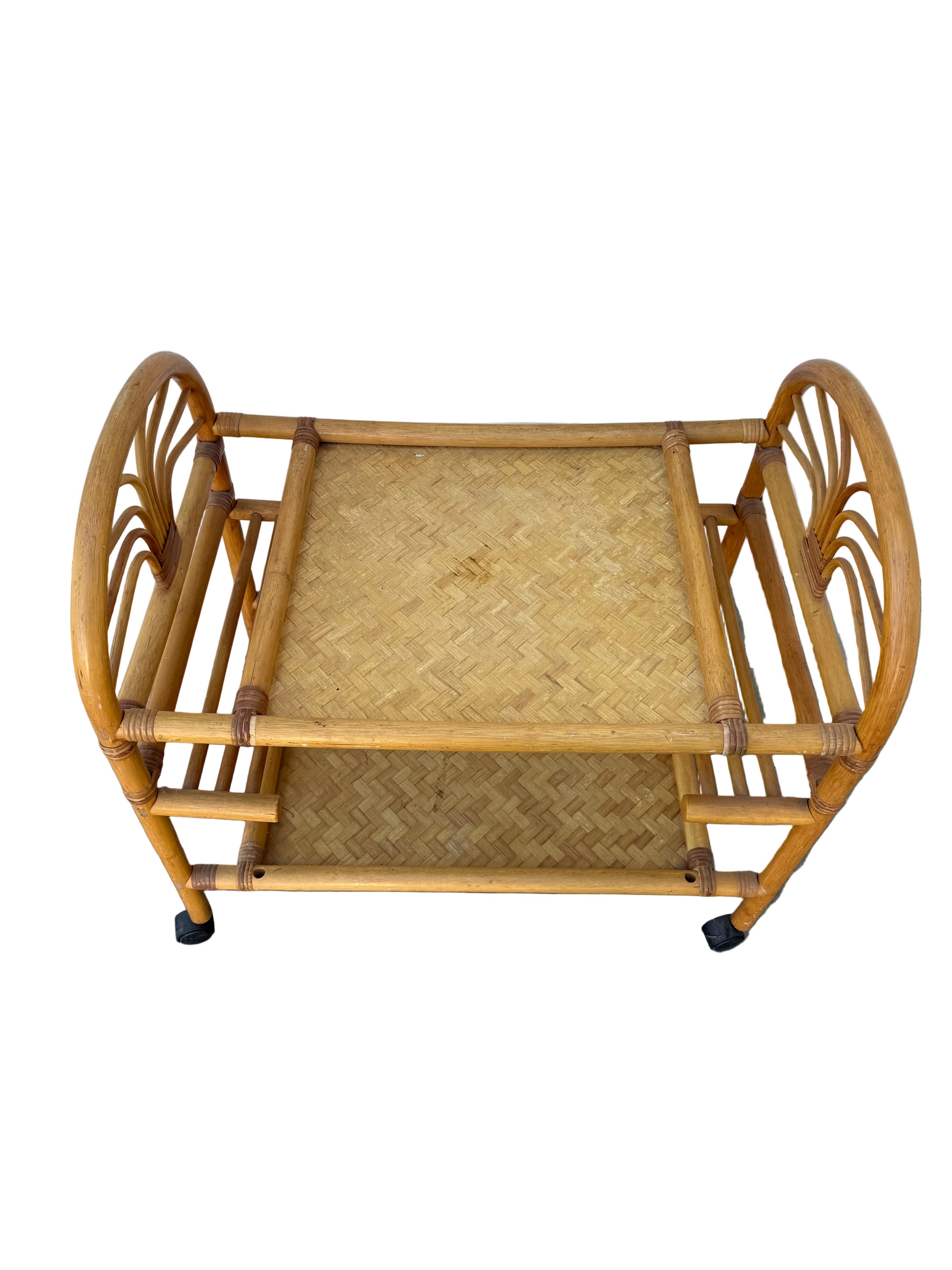 Rattan magazine rack on a white background